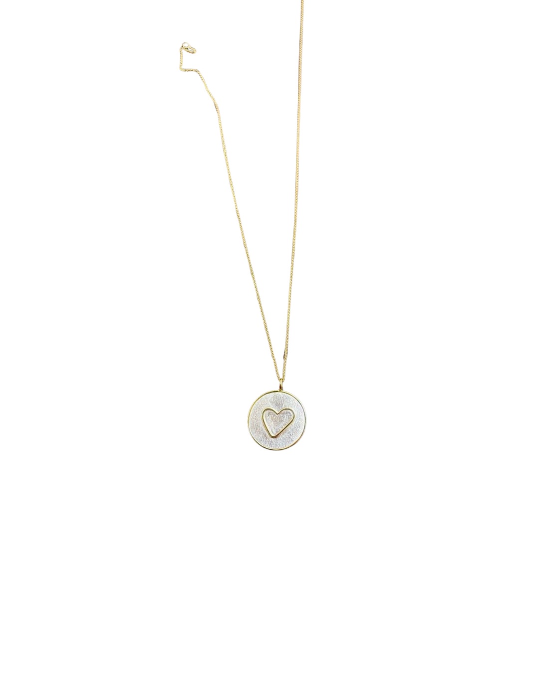 Bespoke silver and gold heart pendant on a fine gold chain, made by Joon