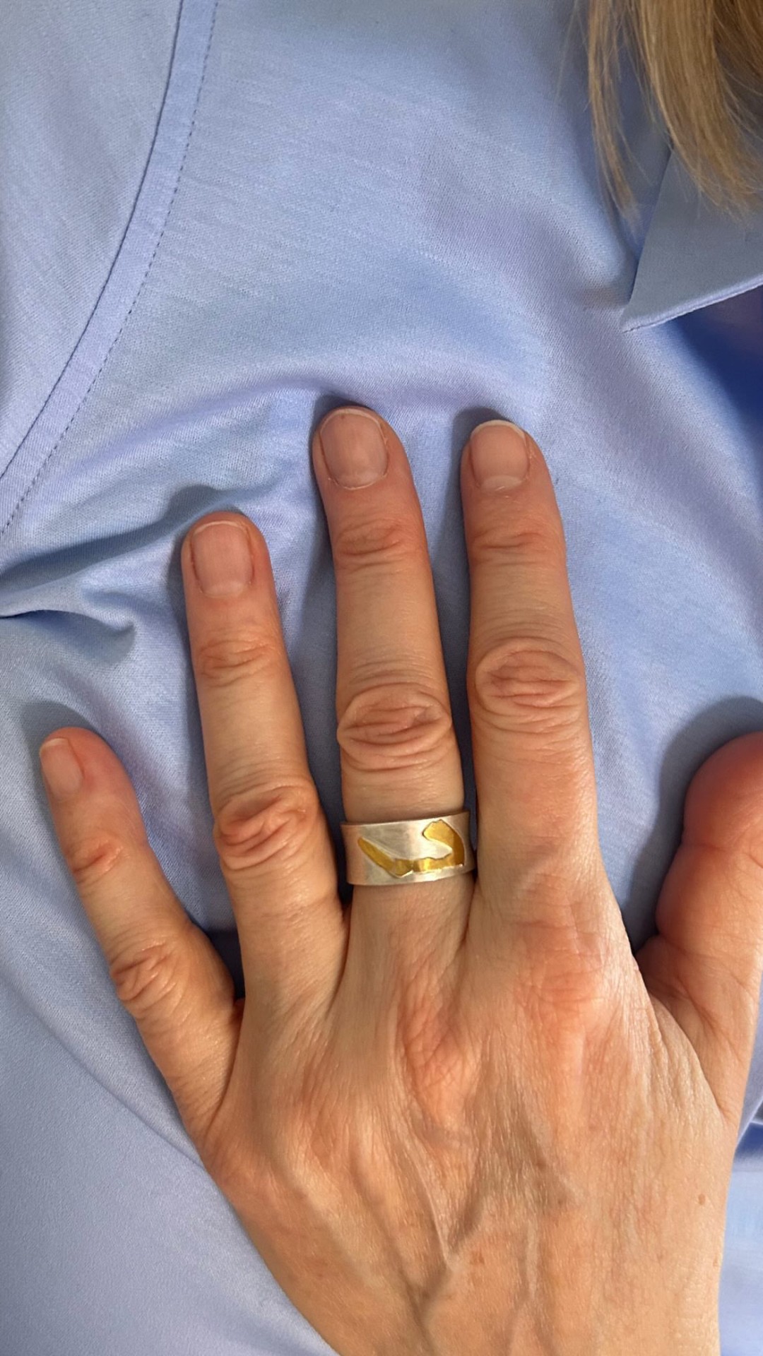 Bespoke wide silver ring with hand-inlaid gold detail, made by Joon